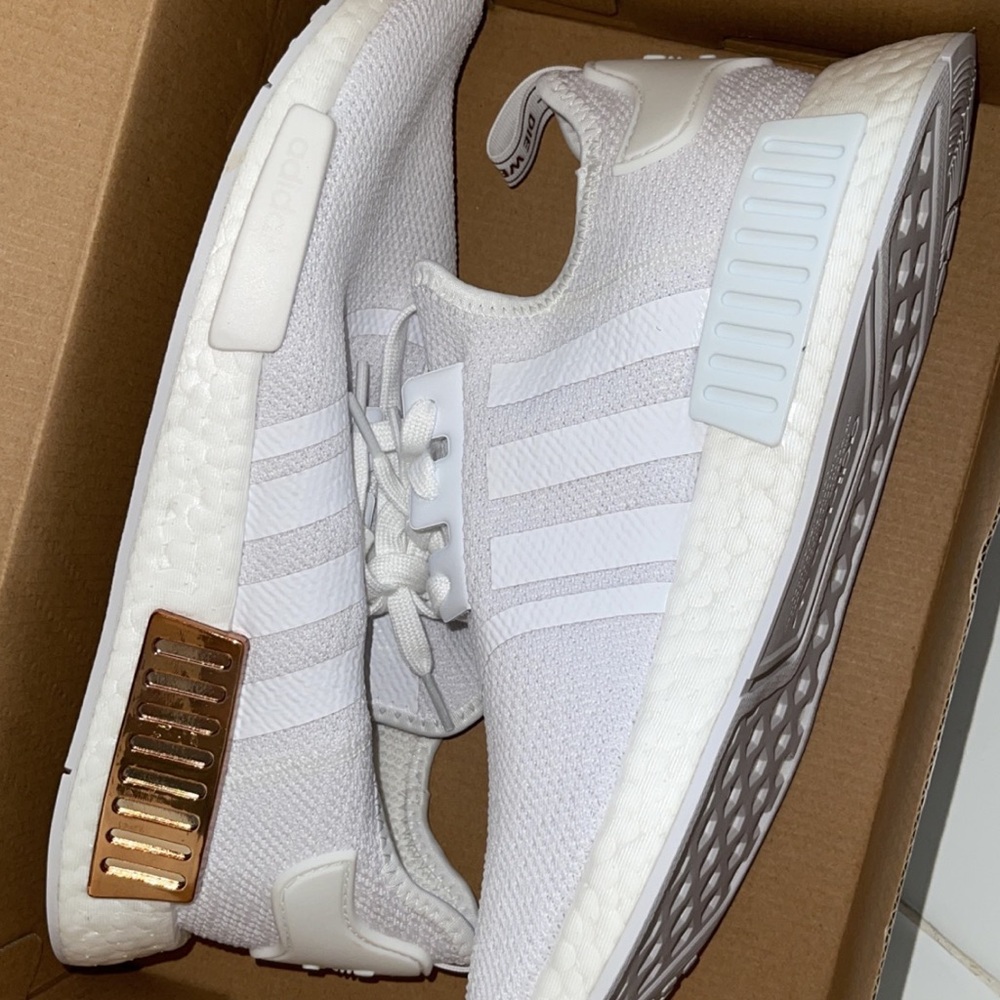 White NMD r1 with gold accent
